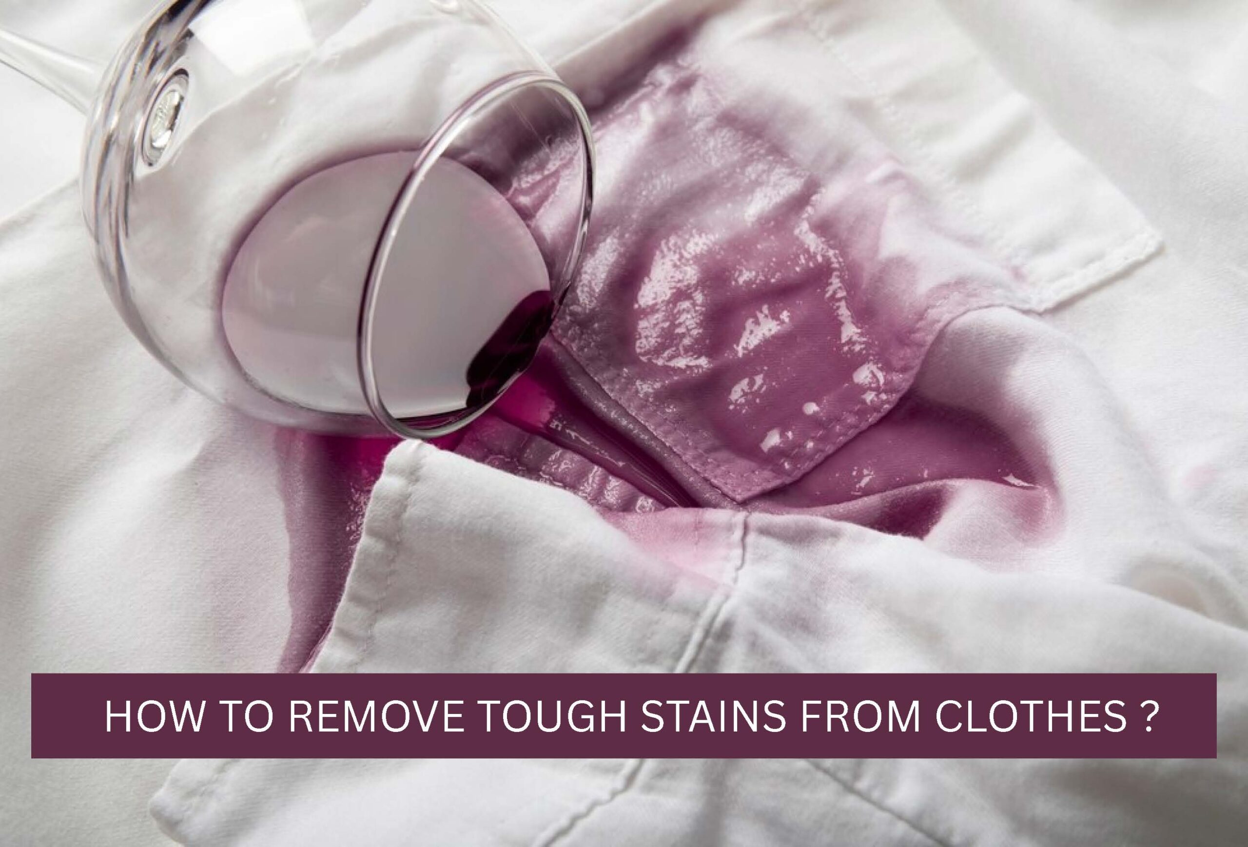 Hand applying stain remover to a stubborn spot on a shirt.