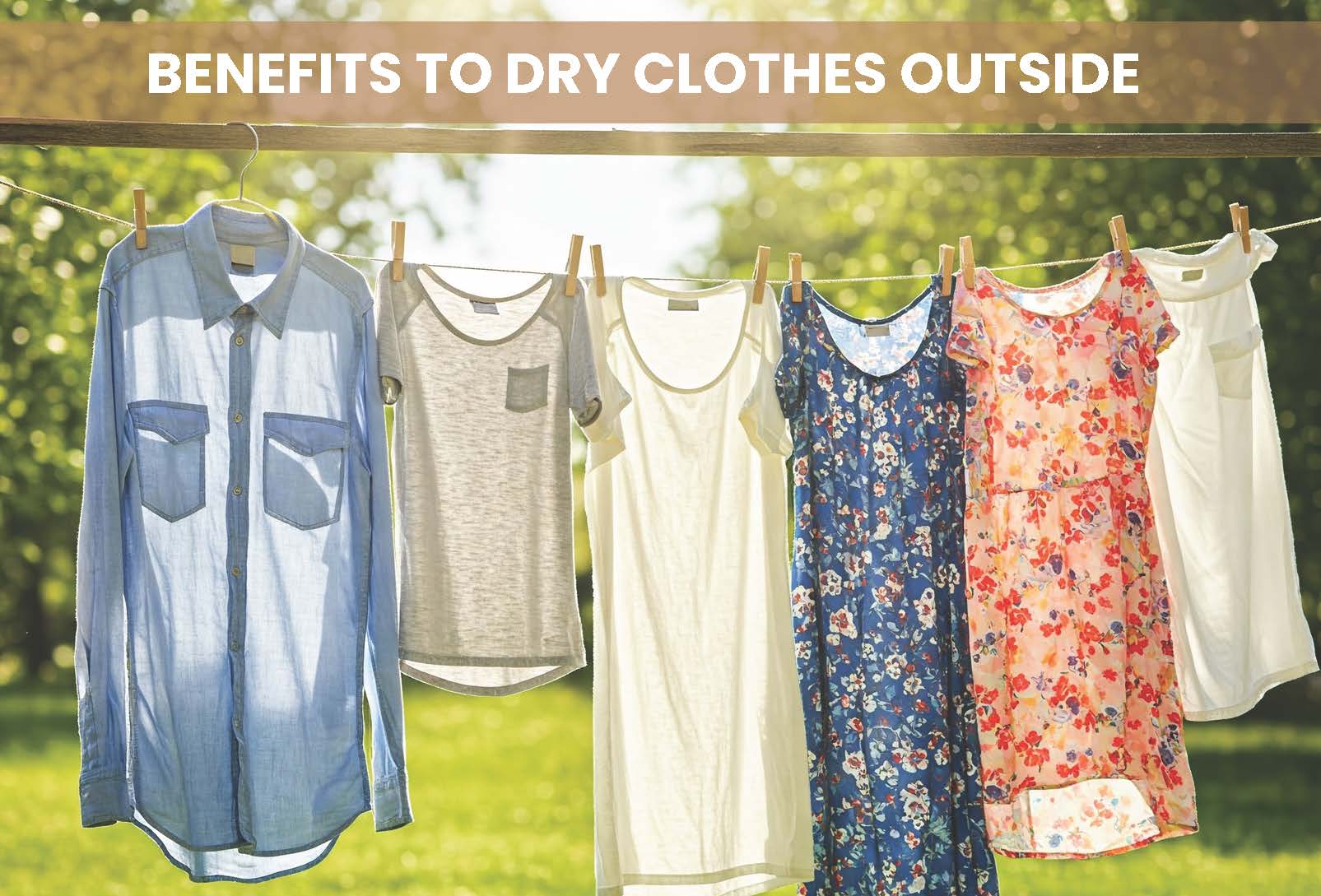 Clothes hanging on a clothesline outside under sunlight and blue sky.